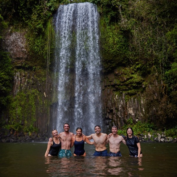 Group standing next to a Milla Milla Waterfalls