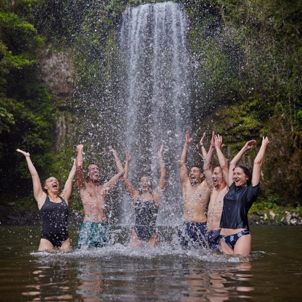 The group having fun in the water at Milla Milla Waterfalls