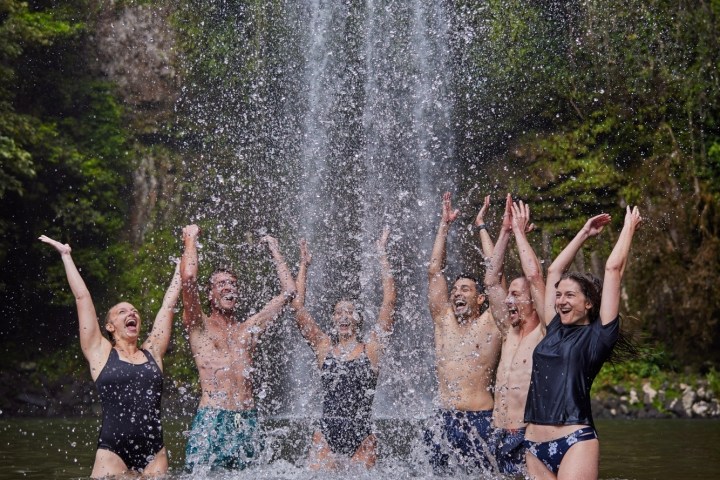 The group having fun in the water at Milla Milla Waterfalls