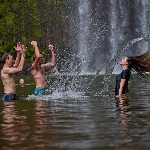 Group riding skis on a lake during a Milla Milla Waterfalls