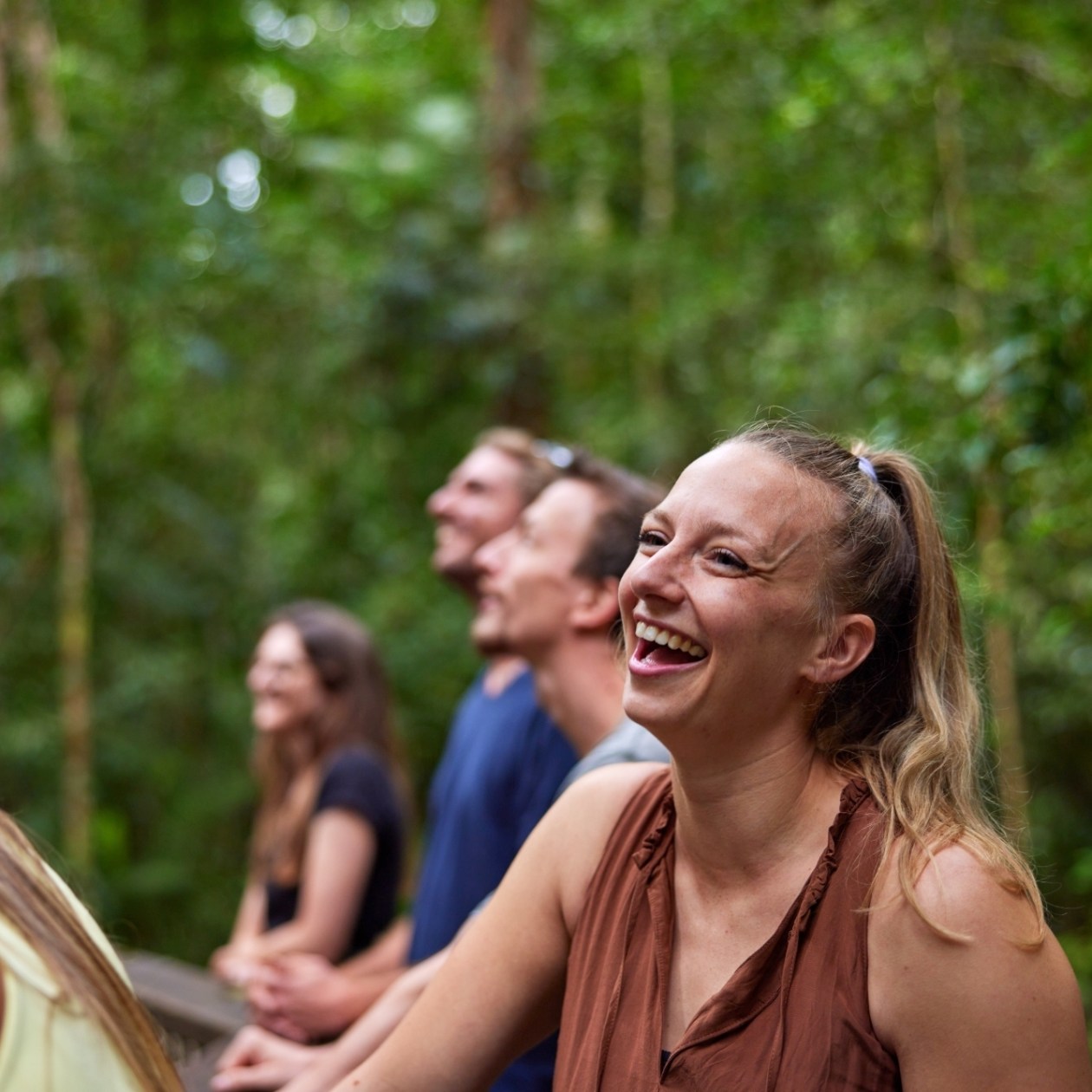 NEW – Other Misc; (C) Barefoot Tours (3)2024 Woman smiling and having fun on a rainforest day trip in Cairns